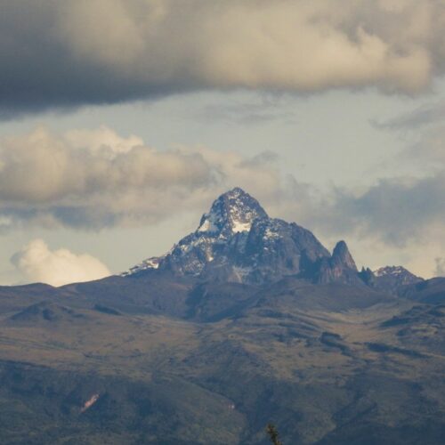Snow-capped peaks of Mount Kenya seen from a distance