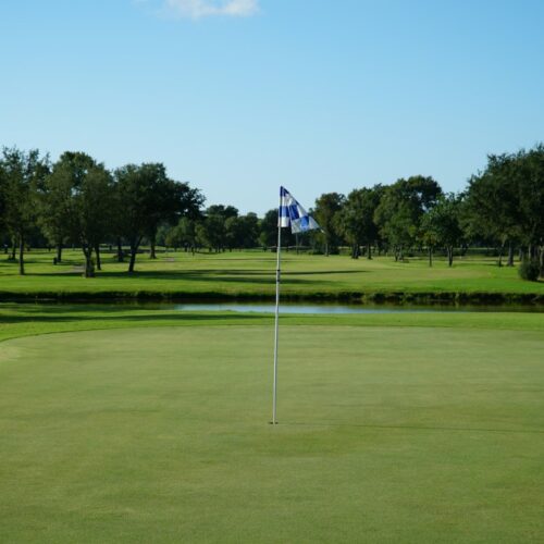 Green golf fairway, part of a Rwanda golf and gorilla safari