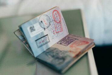 Kenya eTA – an open passport with colourful ink stamps on its pages