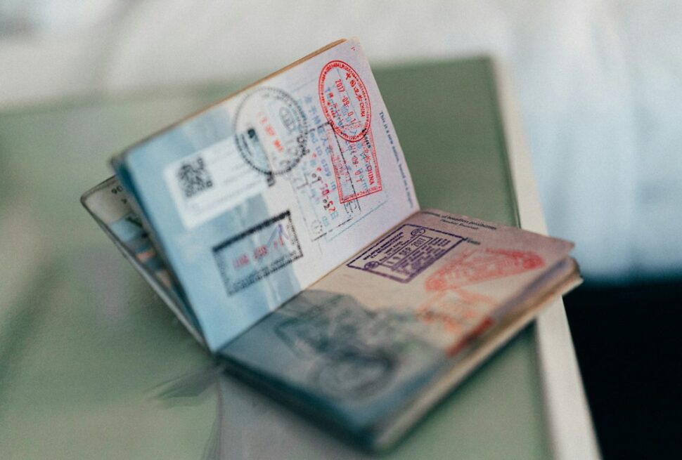 Kenya eTA – an open passport with colourful ink stamps on its pages
