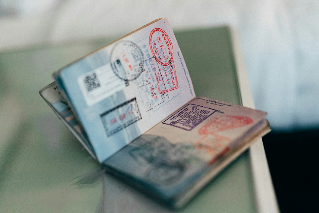 Kenya eTA – an open passport with colourful ink stamps on its pages